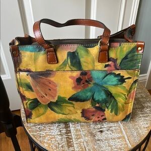 Patricia Nash butterfly handbag. Leather, RFID, zip closure, snap front pocket.